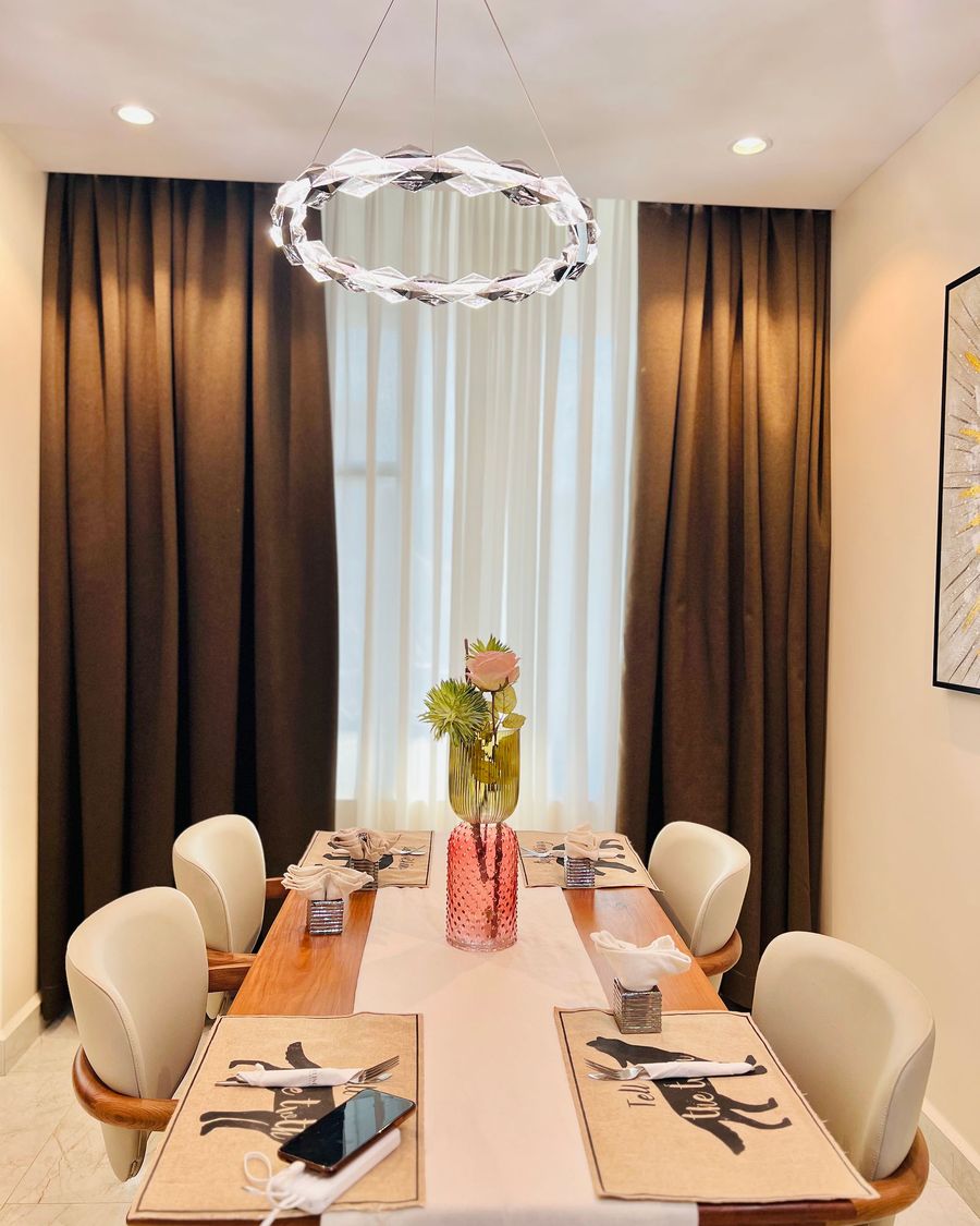 Maison Luxe Apartments dining room.